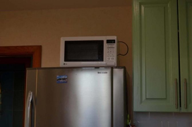 Какой вес можно ставить на крышку холодильника